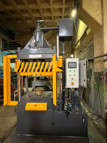 Hydraulic press with safety guarding